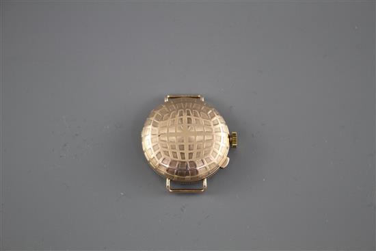 A ladys 1930s yellow metal (stamped 9c) Golfball? manual wind wristwatch, with hinged cover, no strap,